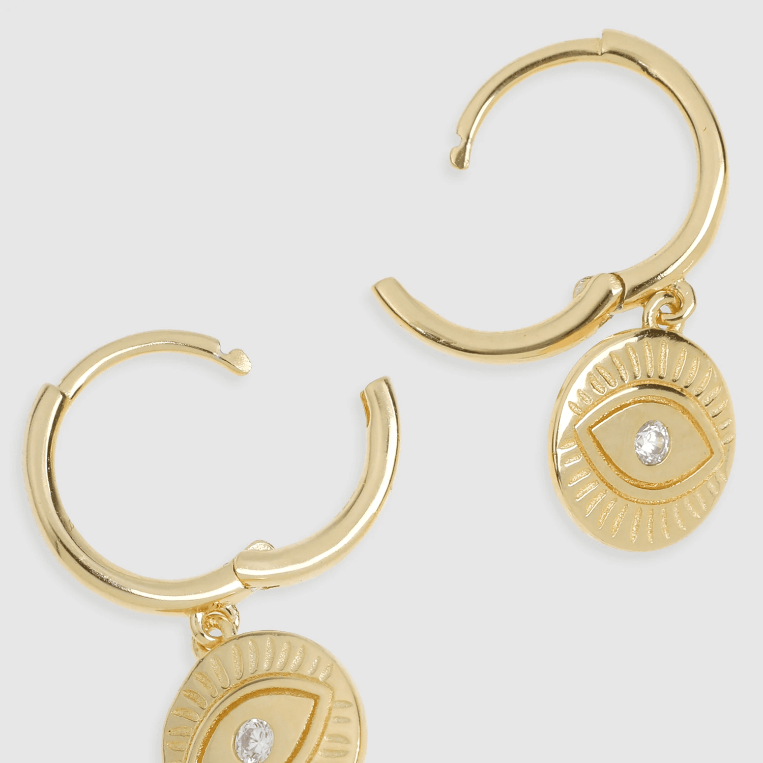 arms of eve protective eye gold hoop huggies earrings with clasp open